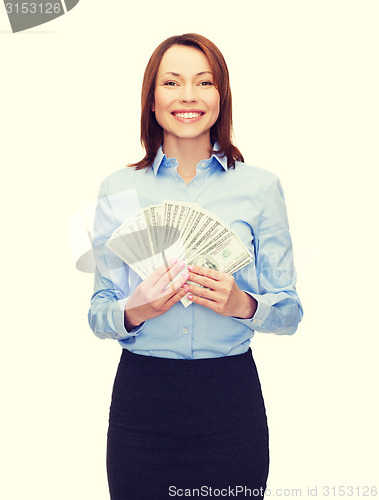 Image of young businesswoman with dollar cash money