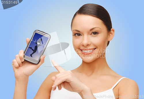 Image of happy woman showing smartphone blank screen