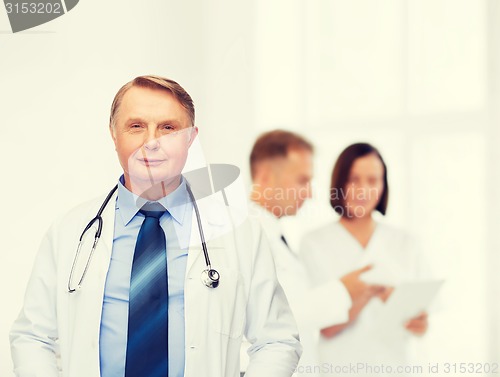 Image of smiling doctor or professor with stethoscope