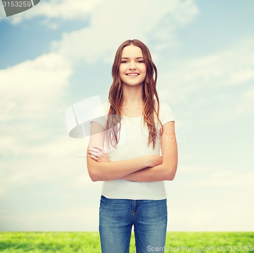 Image of smiling teenager in blank white t-shirt