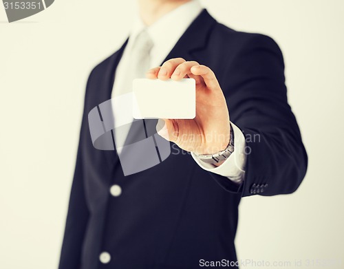 Image of man hand with blank paper