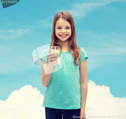 Image of smiling little girl with glass of milk
