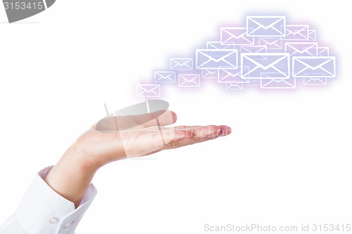 Image of Email Cloud Leaving The Palm Of A Hand On White