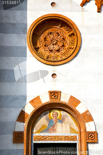 Image of rose window  italy  lombardy     in  the mercallo old      tower
