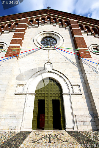 Image of  church  in  the varano borghi    closed brick tower sidewalk it