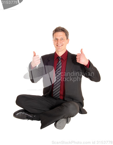 Image of Businessman with thumb up.