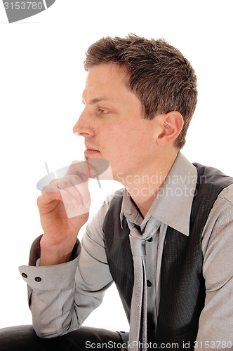 Image of Young businessman thinking.