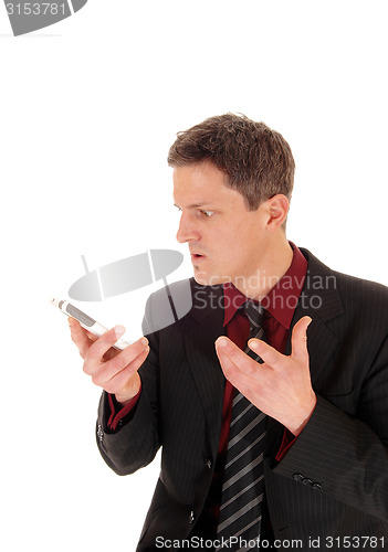 Image of Man screaming in cell phone.