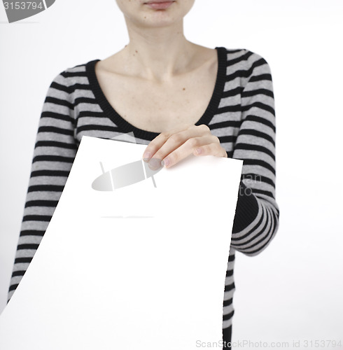 Image of Woman holding a paper