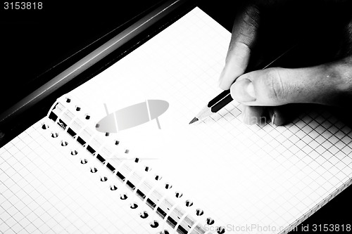 Image of Pencil and agenda