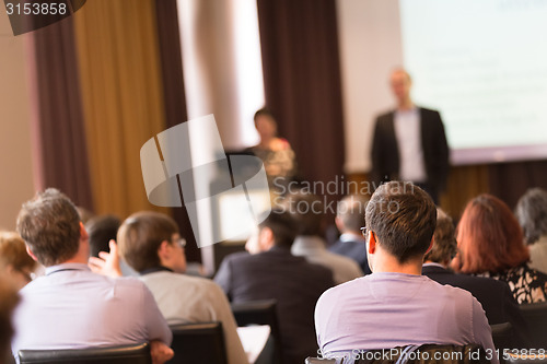 Image of Speaker at Business Conference and Presentation