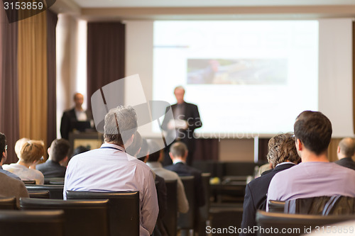 Image of Speaker at Business Conference and Presentation