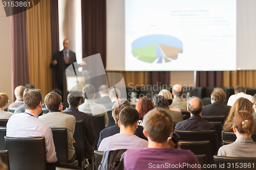 Image of Speaker at Business Conference and Presentation