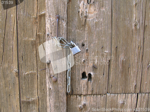 Image of Old door with padlock