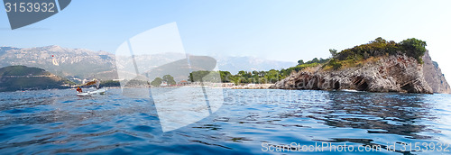 Image of Rocks over the transparent ocean water