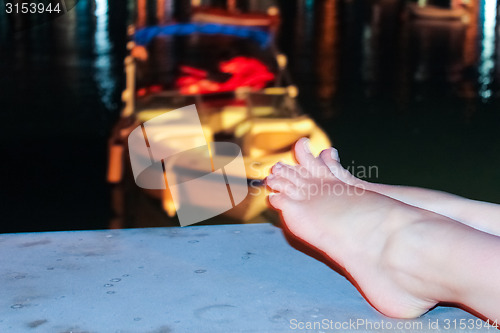 Image of Vacation holidays. Woman feet closeup