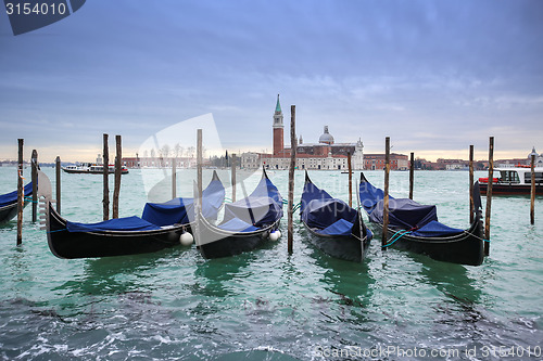 Image of San Giorgio Maggiore church with moored gondolas