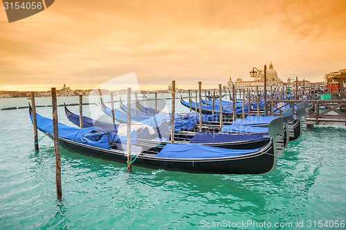 Image of Gondolas with view of Santa Maria della Salute at sunset