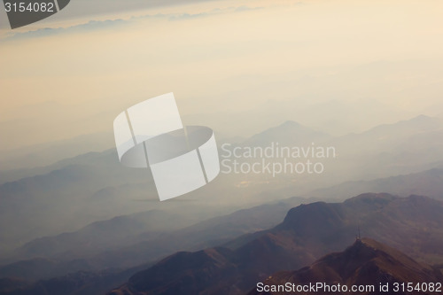 Image of Landscape of Mountain.  view from airplane window