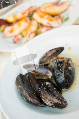 Image of Mussels in the bowl in a white wine sauce