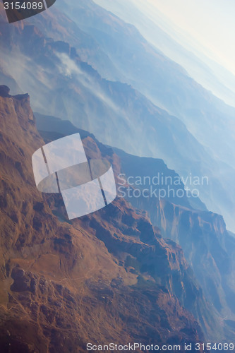 Image of Landscape of Mountain.  view from airplane window