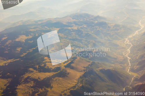 Image of Landscape of Mountain.  view from airplane window