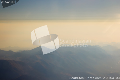 Image of Landscape of Mountain.  view from airplane window