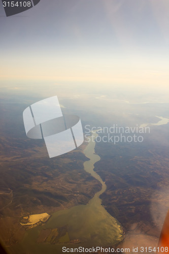 Image of Landscape of Mountain.  view from airplane window
