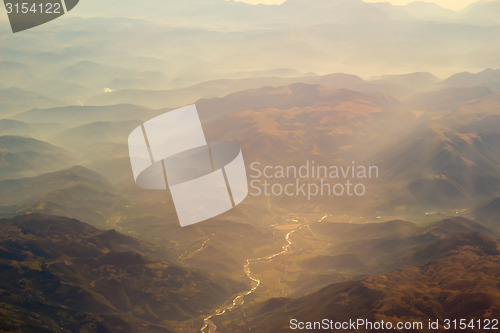 Image of Landscape of Mountain.  view from airplane window