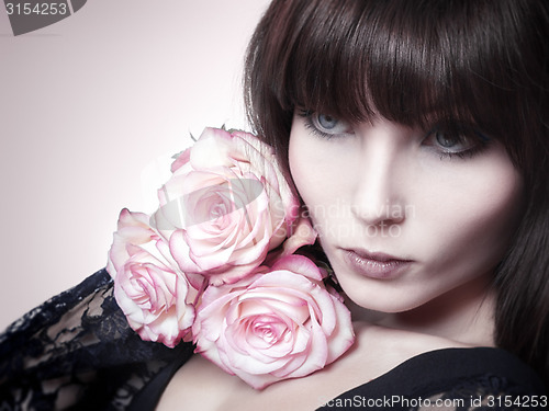 Image of woman and roses
