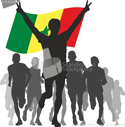 Image of Winner with the Senegal flag at the finish