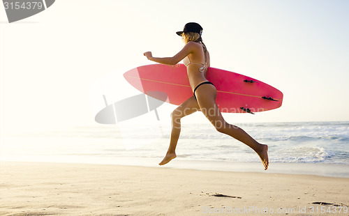 Image of Blonde surfer Girl