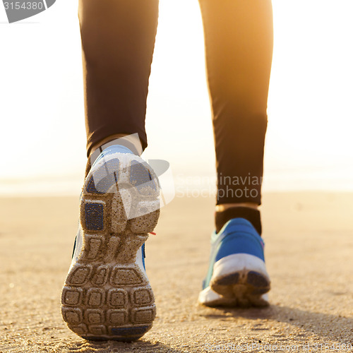 Image of Beautiful woman running