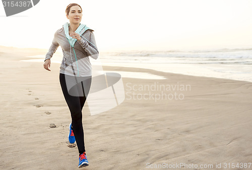 Image of Beautiful woman running
