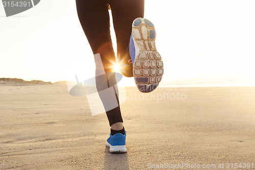 Image of Beautiful woman running