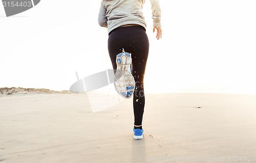 Image of Beautiful woman running