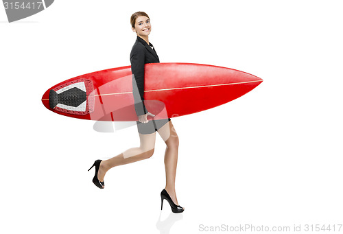 Image of Businesswoman going to surf