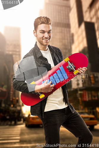 Image of Young man with a skateboard