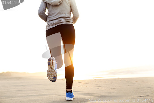 Image of Beautiful woman running