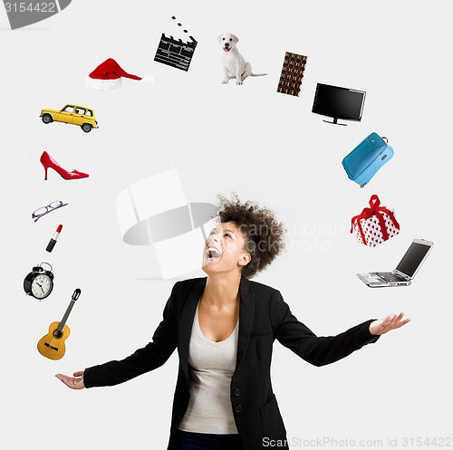 Image of Afro-American woman juggling objects