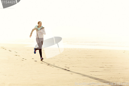 Image of Beautiful woman running