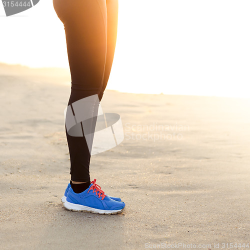 Image of Beautiful woman running