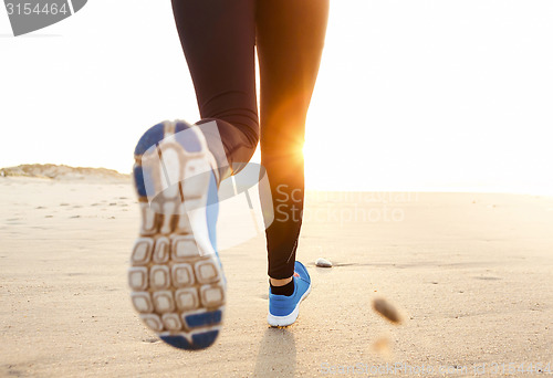 Image of Beautiful woman running