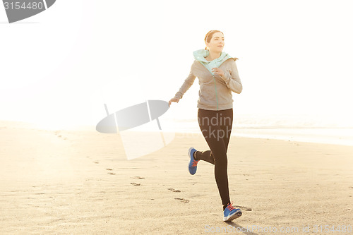 Image of Beautiful woman running