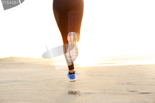 Image of Beautiful woman running