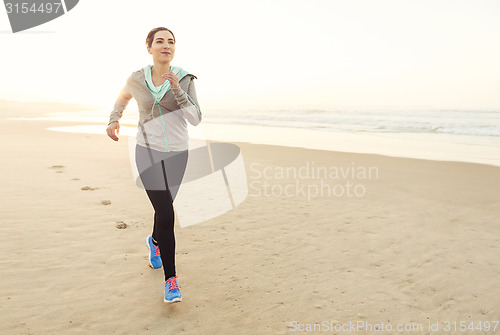 Image of Beautiful woman running
