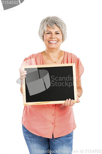 Image of Old woman holding a chalkboard