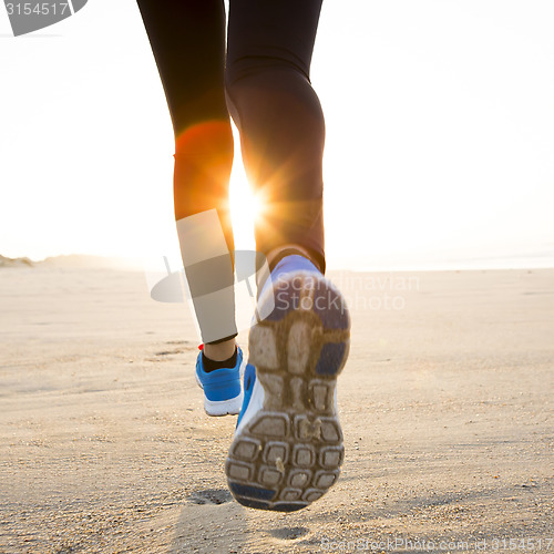 Image of Beautiful woman running