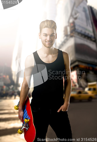 Image of Young man with a skateboard