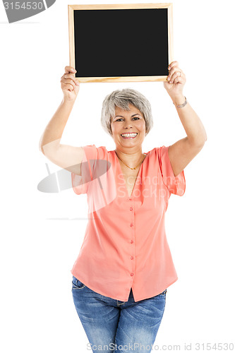 Image of Old woman holding a chalkboard